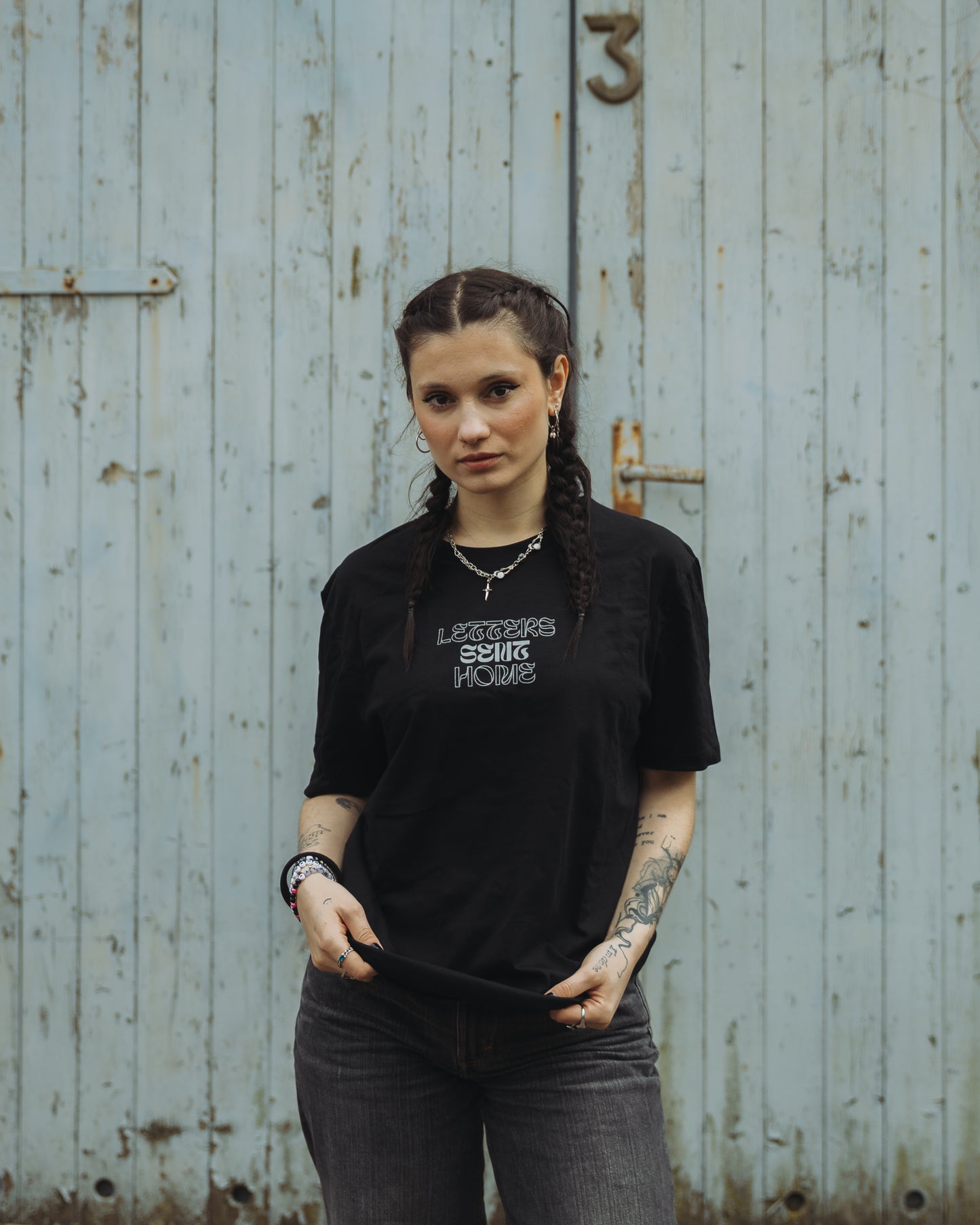 black in the name of god tshirt